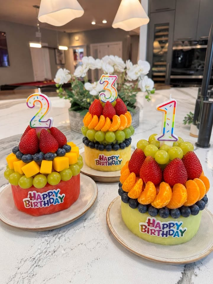 Trio of mini birthday cakes with number candles