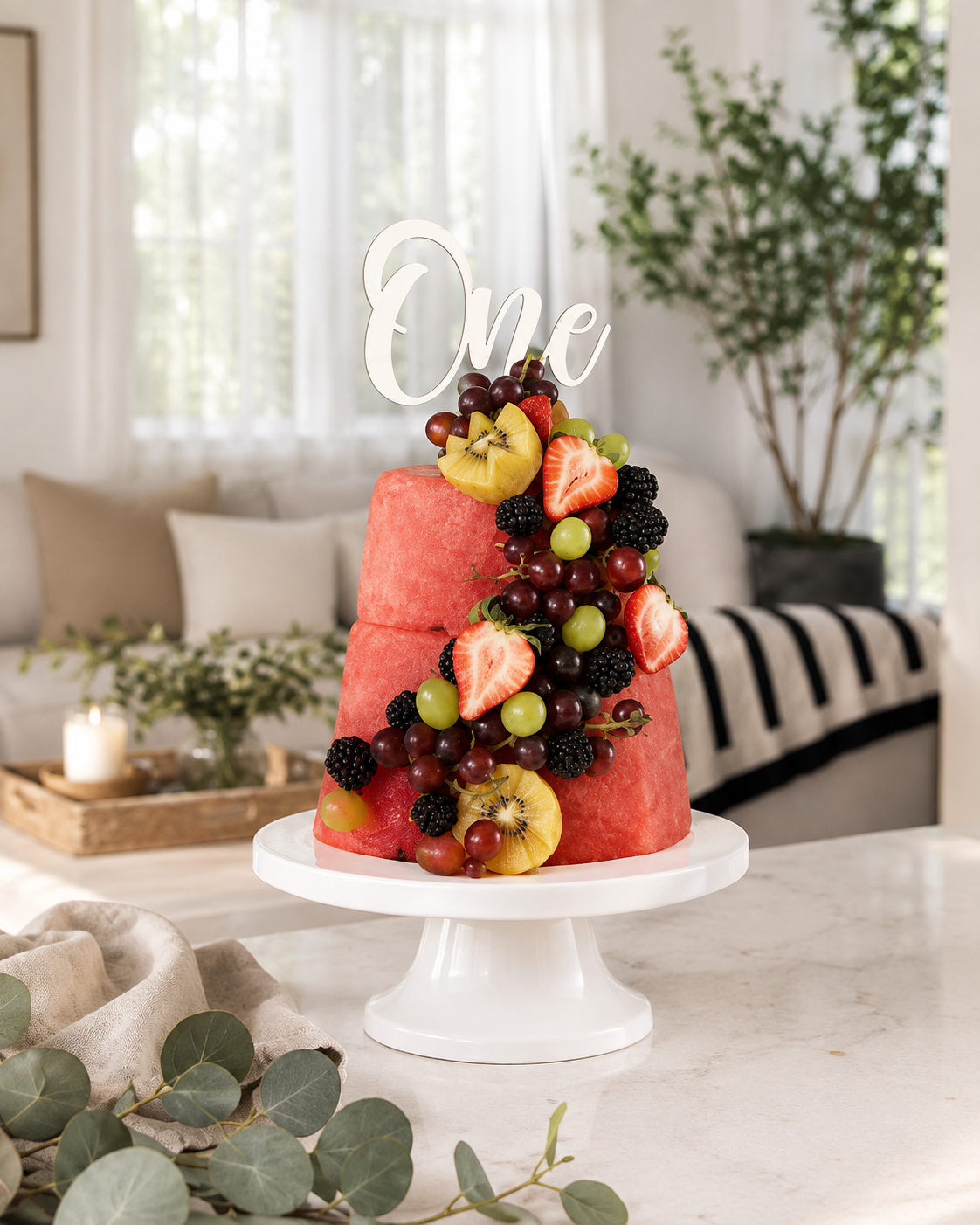 First birthday two-tier with 'One' topper